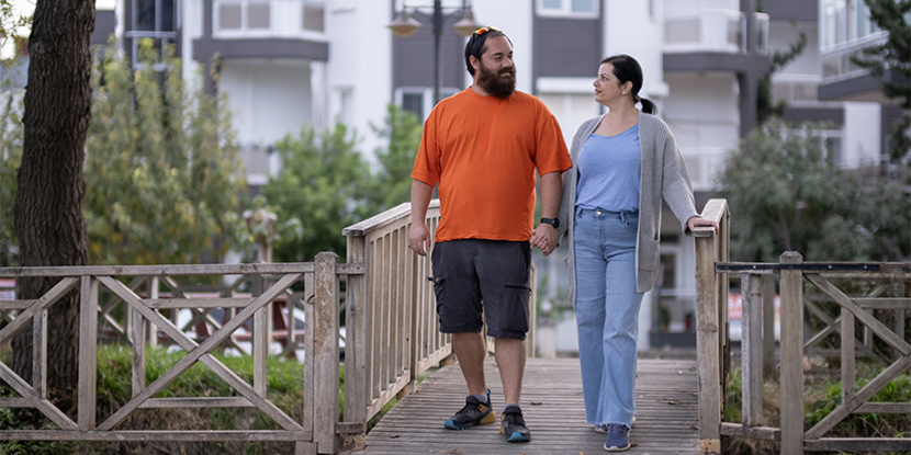 man and woman on bridge