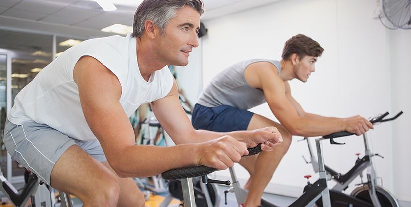 men on spin bikes