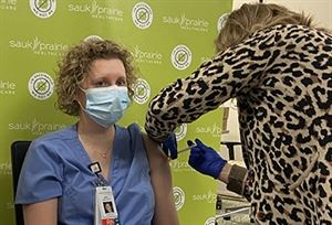 woman getting vaccine