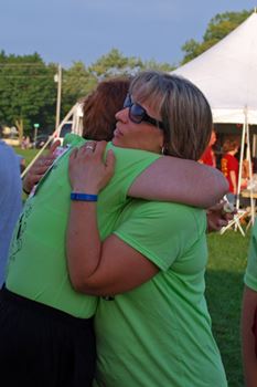 ladies hugging