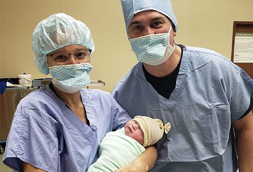 woman holding baby