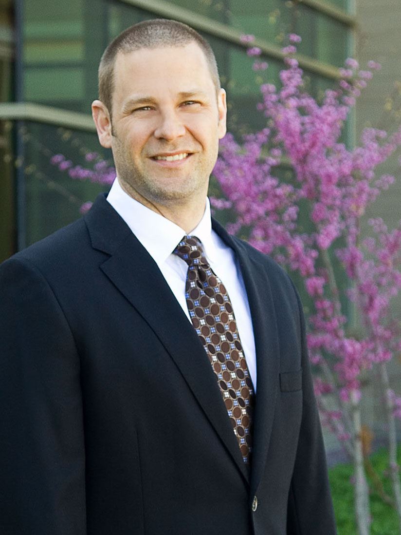 man in suit smiling