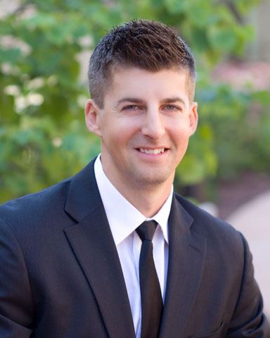 man in suit smiling